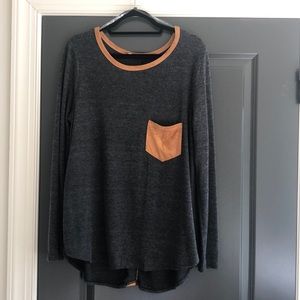 Tee shirt with suede like detail.